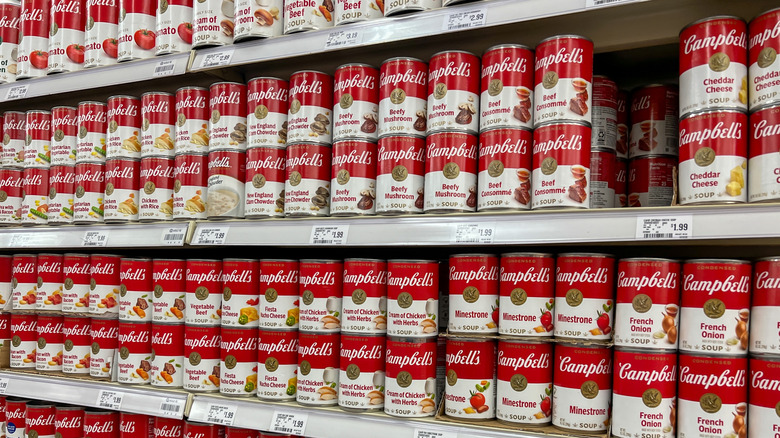 Grocery store shelves stocked with Campbell's canned soups