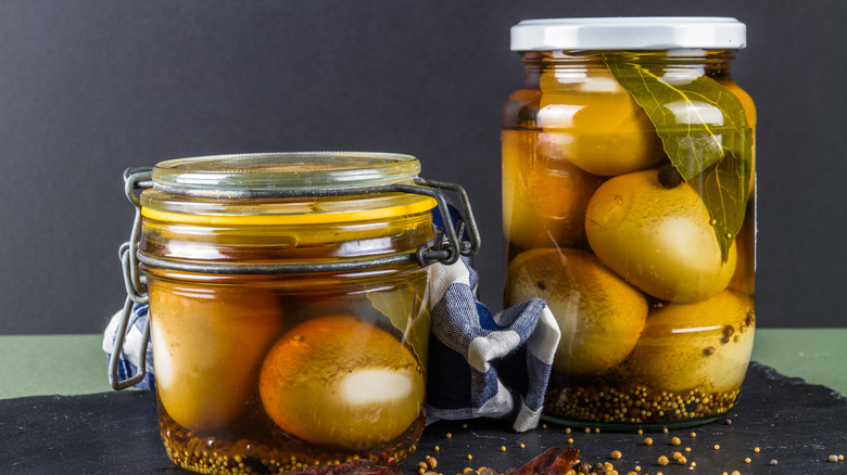two jars of pickled eggs