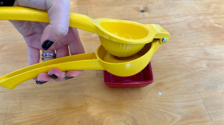 Lemon being juiced