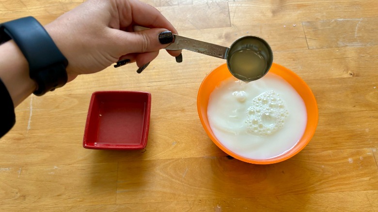 lemon juice poured into milk