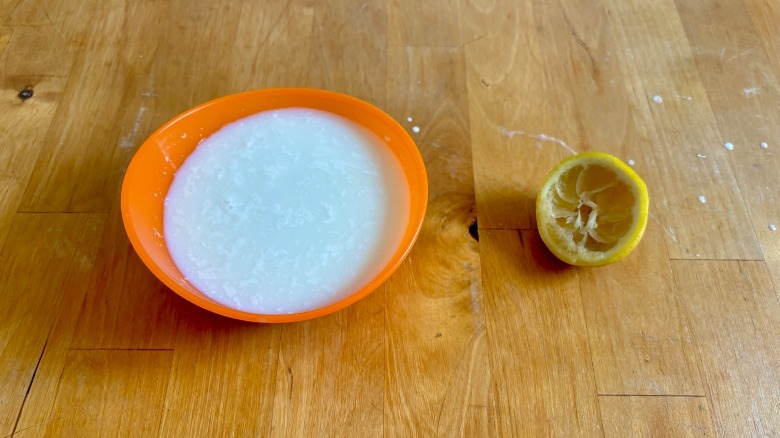 curdled milk next to lemon half