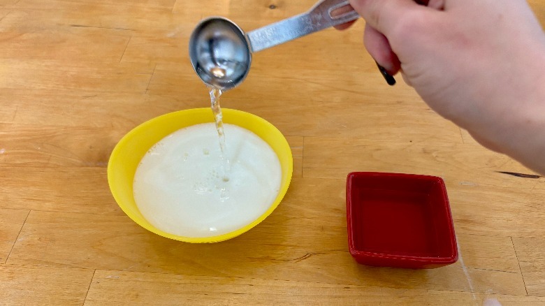 Vinegar poured into bowl